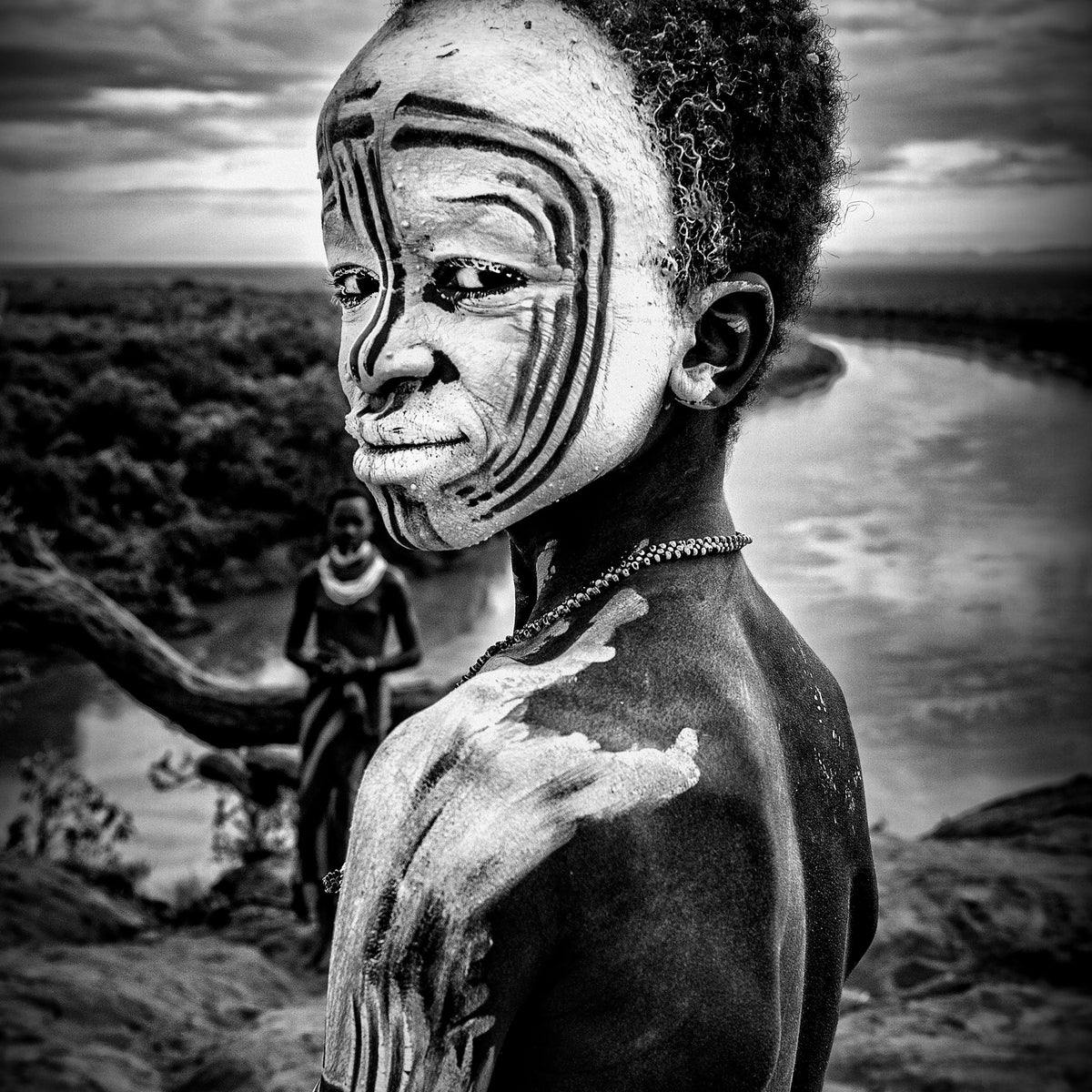 4-piece-aluminium-print-a-boy-of-the-karo-tribe-omo-valley