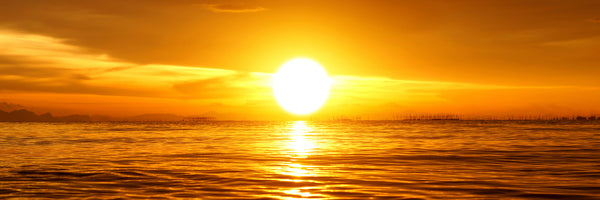 panoramic-3-piece-acrylic-print-glowing-sunset-on-the-water-panorama